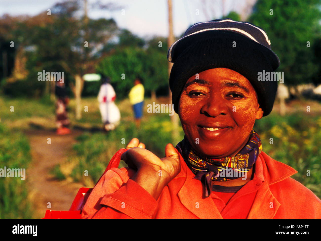 zulu woman with sun protection, uMkhanyakude, St. Lucia, South Africa Stock Photo