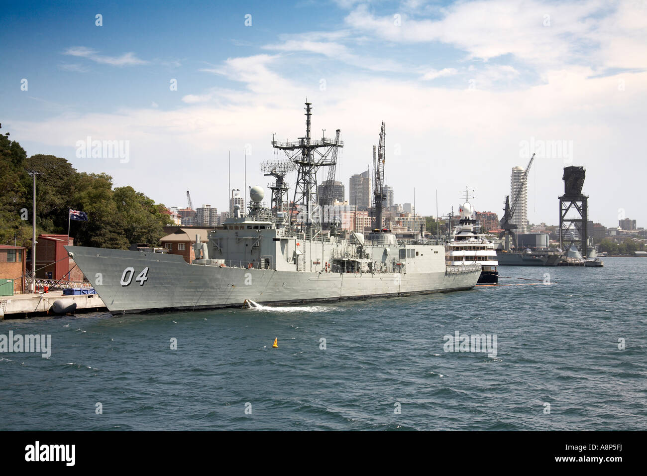 Garden Island RAN Naval base with warship cruiser yacht and crane in Sydney New South Wales NSW Australia Stock Photo