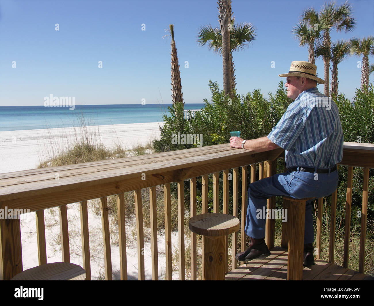 Man sitting on stool hi-res stock photography and images - Alamy