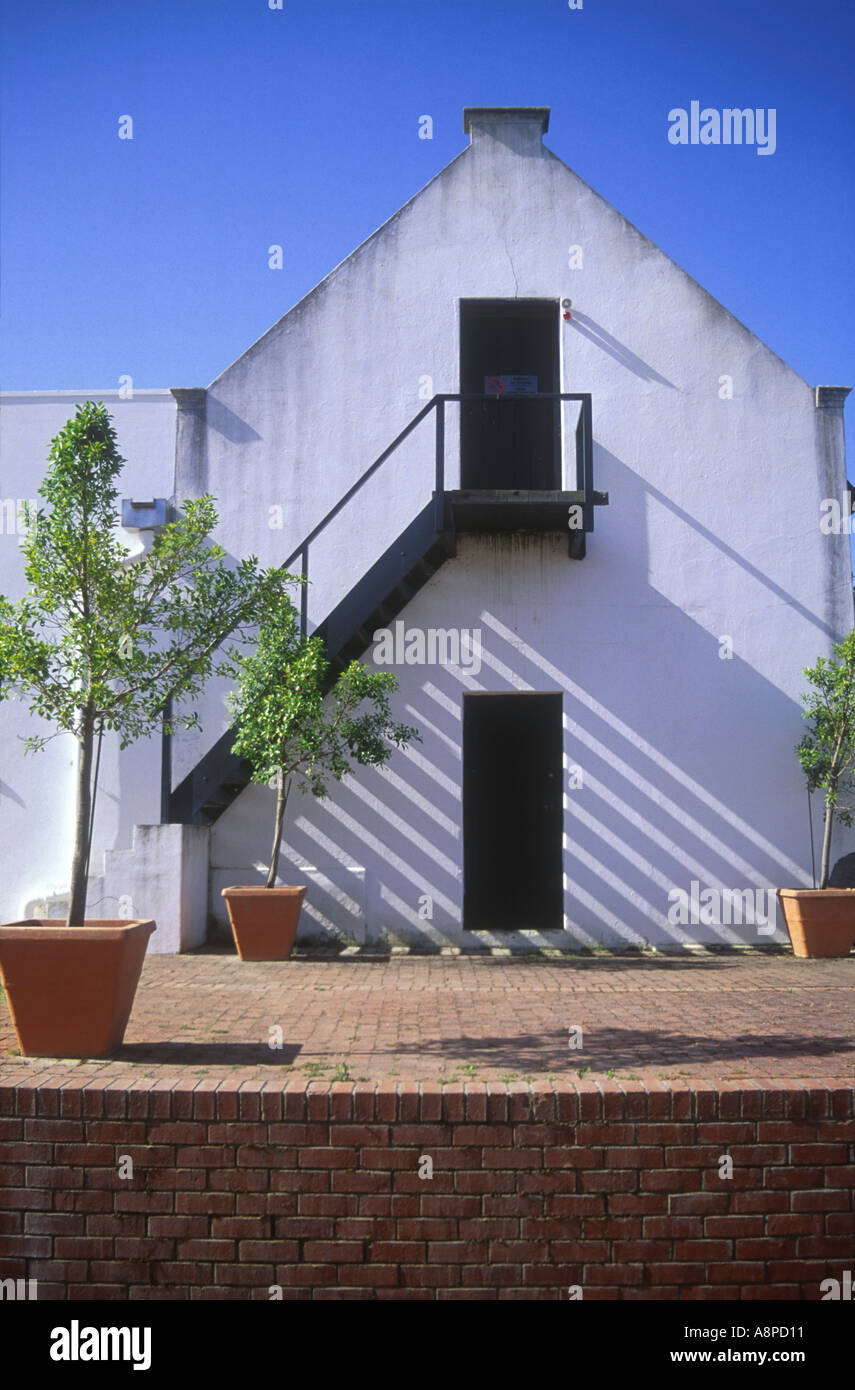 Graphic Stairway up stucco wall Stock Photo