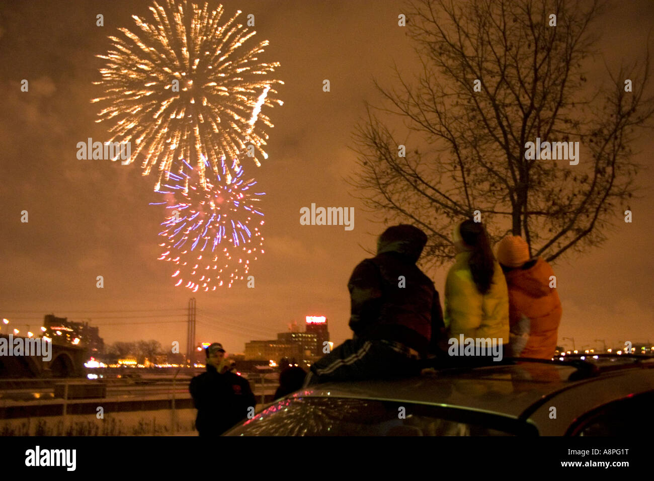 Watching fireworks across the Mississippi River on New Years Eve. St