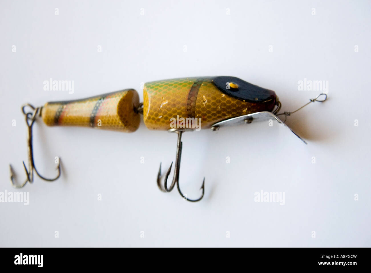 https://c8.alamy.com/comp/A8PGCW/close-up-of-a-jointed-antique-river-runt-like-fishing-lure-st-paul-A8PGCW.jpg