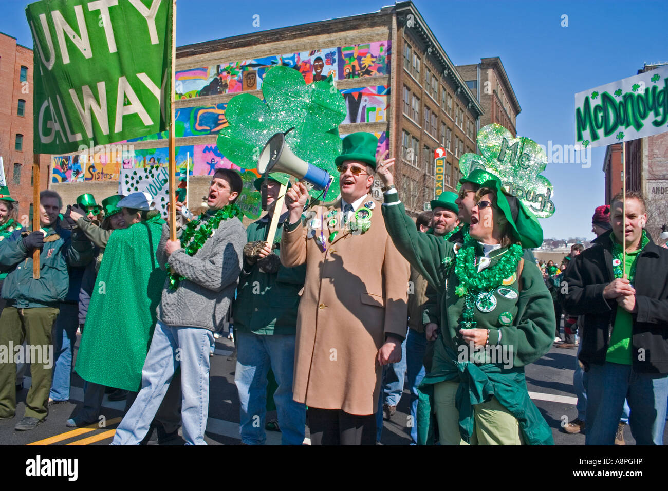 St. Patrick's Day parade clan family marching behind banner. St Paul