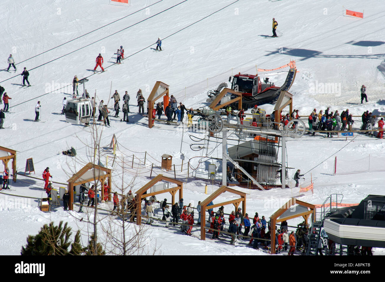 skiers queueing at chairlift station Stock Photo Alamy