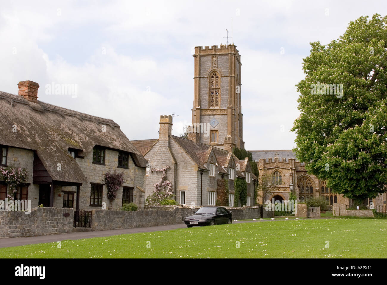 England Somerset Curry Rivel village green and parish church Stock Photo