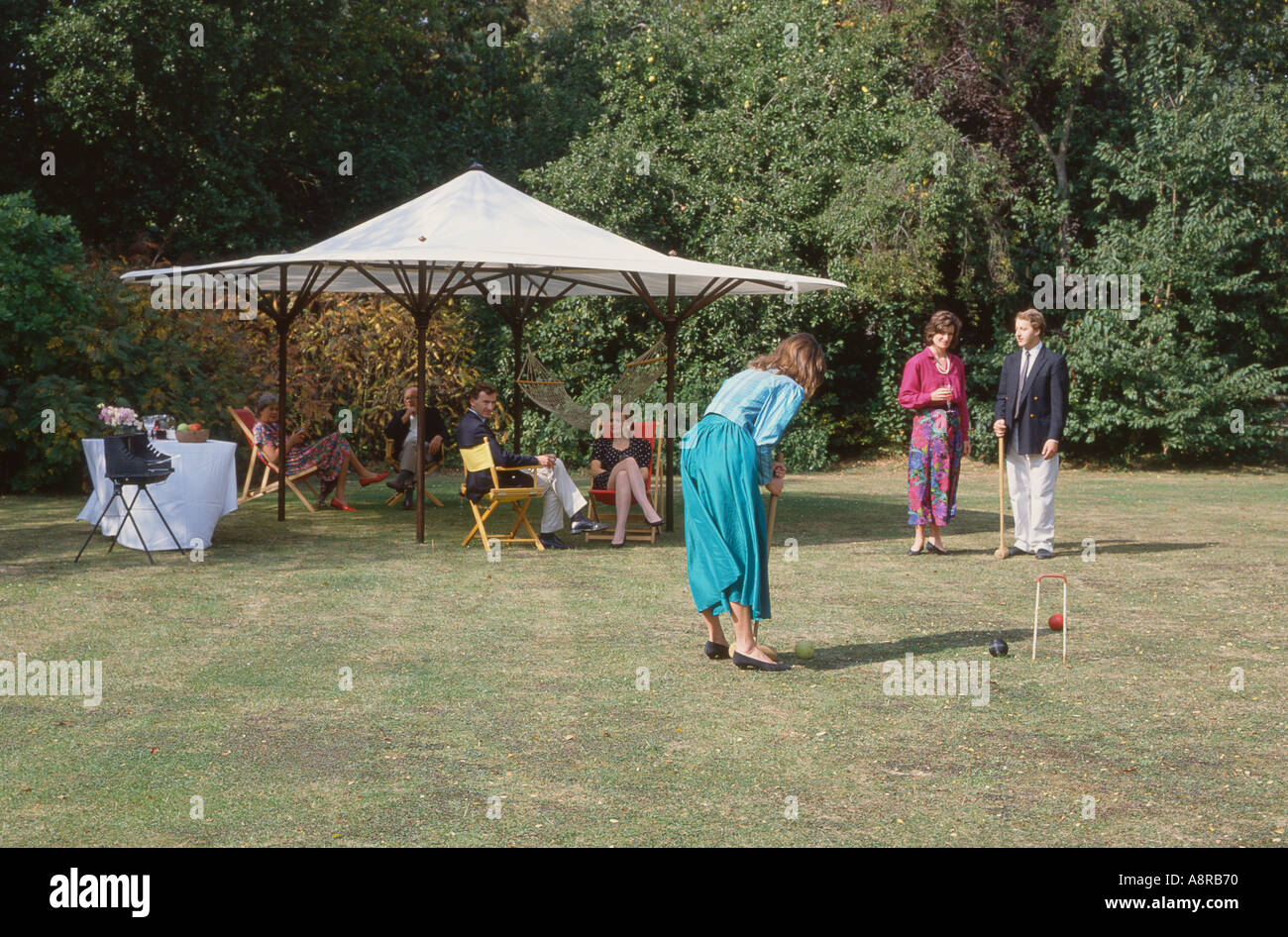 Barbeque shade and croquet in the garden Stock Photo