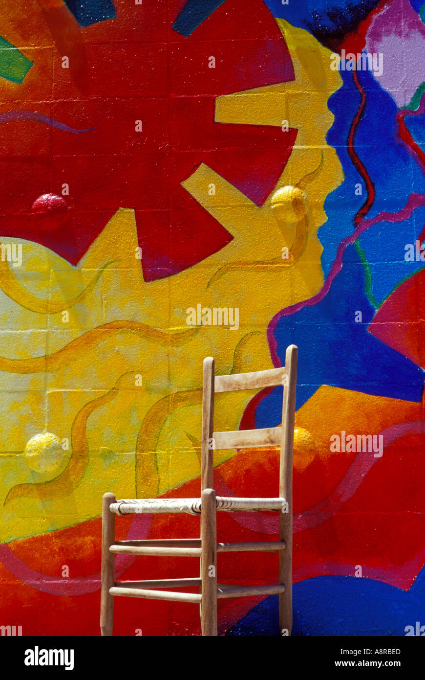 Chair against wall Stock Photo Alamy