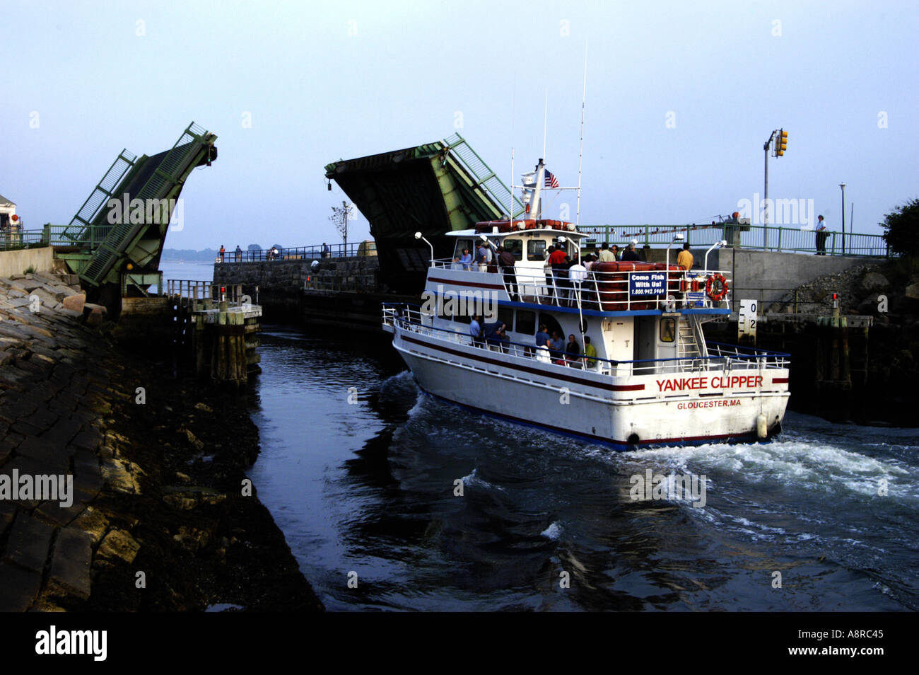 Sightseeing boat passing through drawbridge Gloucester MA USA Stock ...
