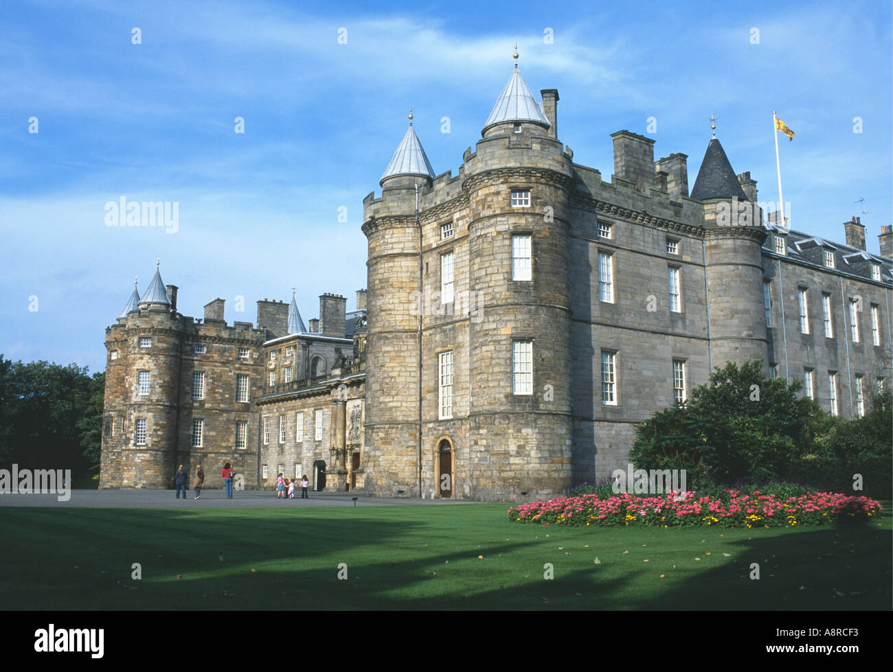 Holyrood Palace façade showing pepperpot towers People exploring the