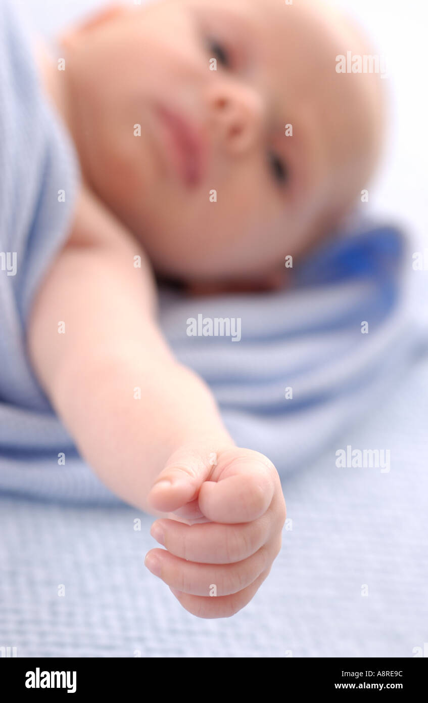 Newborn baby with outstretched arm Stock Photo Alamy
