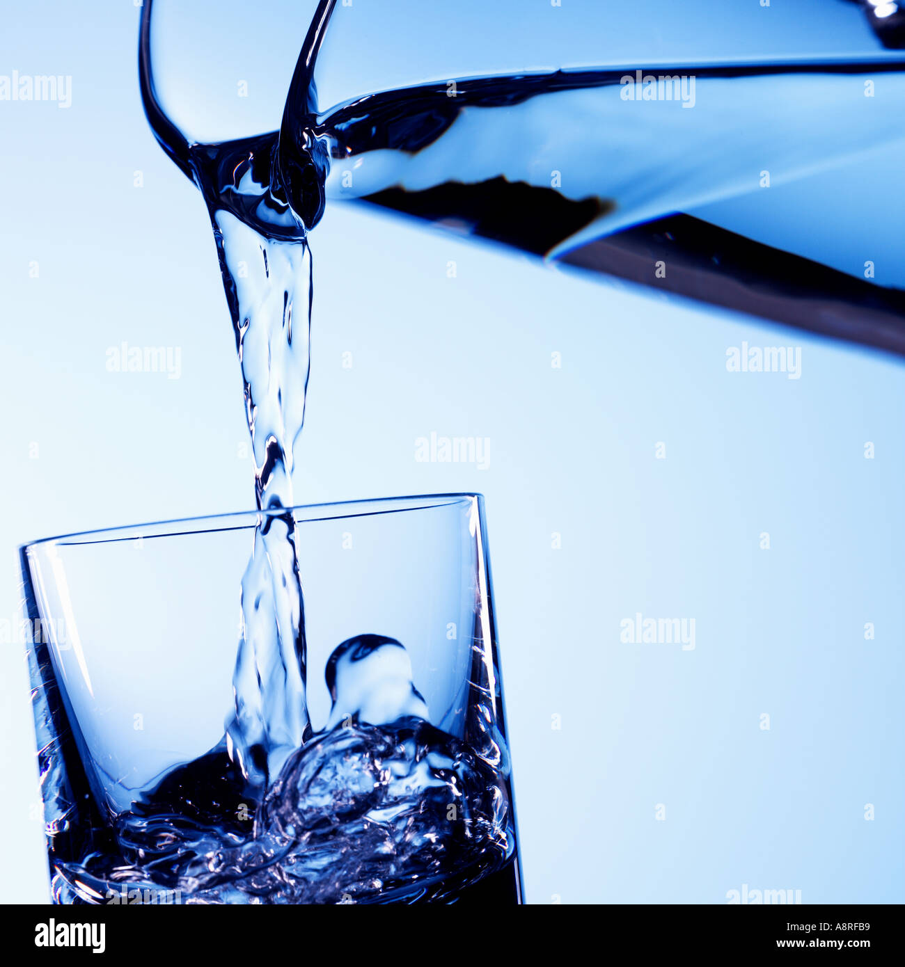 Water pouring into glass Stock Photo Alamy