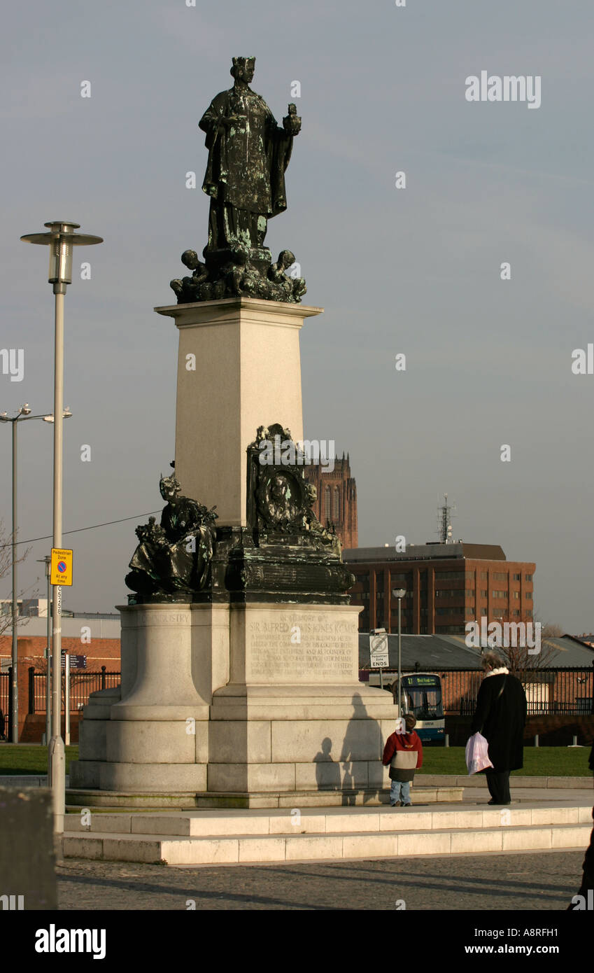 Liverpool boy aged four admiring the statue of his namesake Sir Alfred