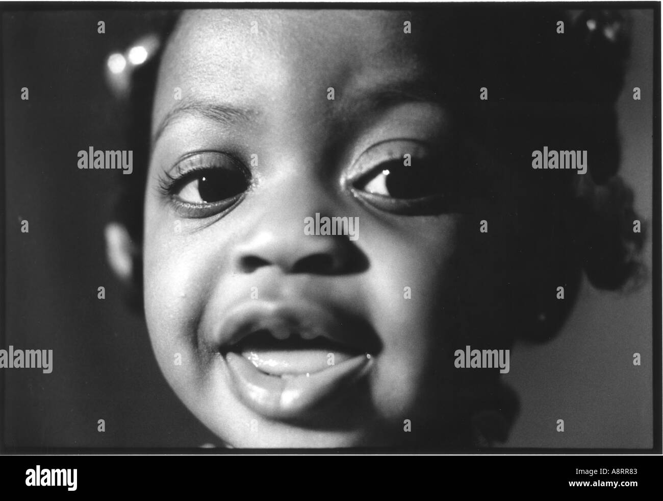 Close up portrait of young African American girl smiling Stock Photo