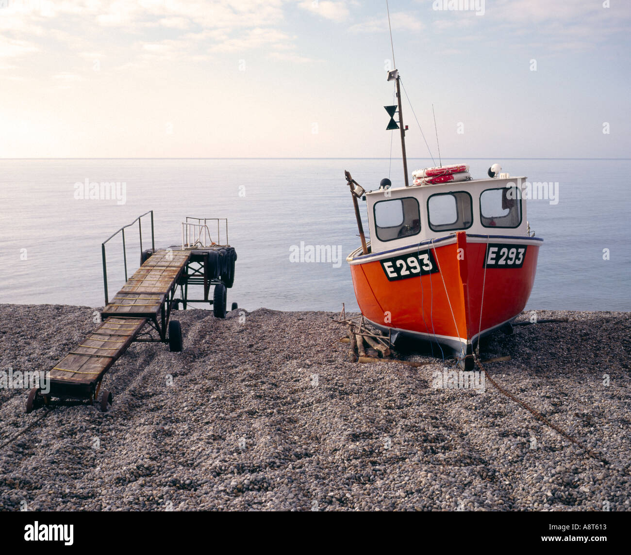 Branscombe pebble beach devon fishing boat Stock Photo - Alamy