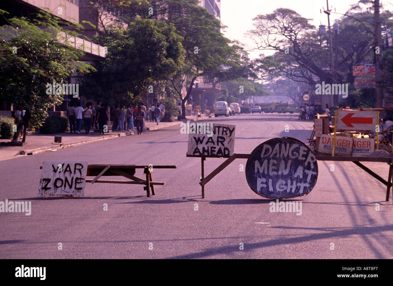 Local humour in adversity on temporary road signs, 1989 Philippine coup