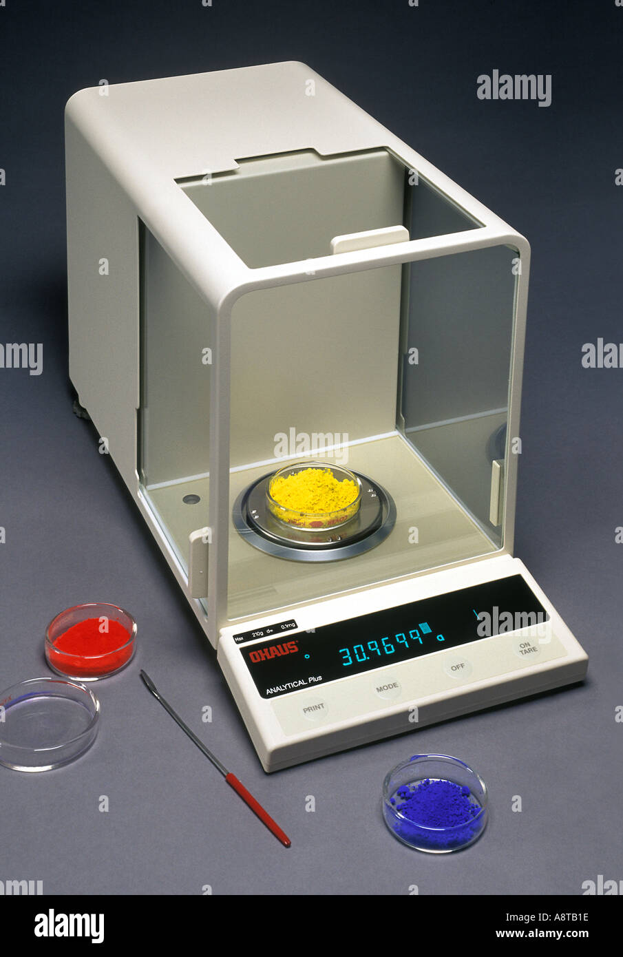 Analytical Scale Measures to 0001 Grams Stock Photo - Alamy