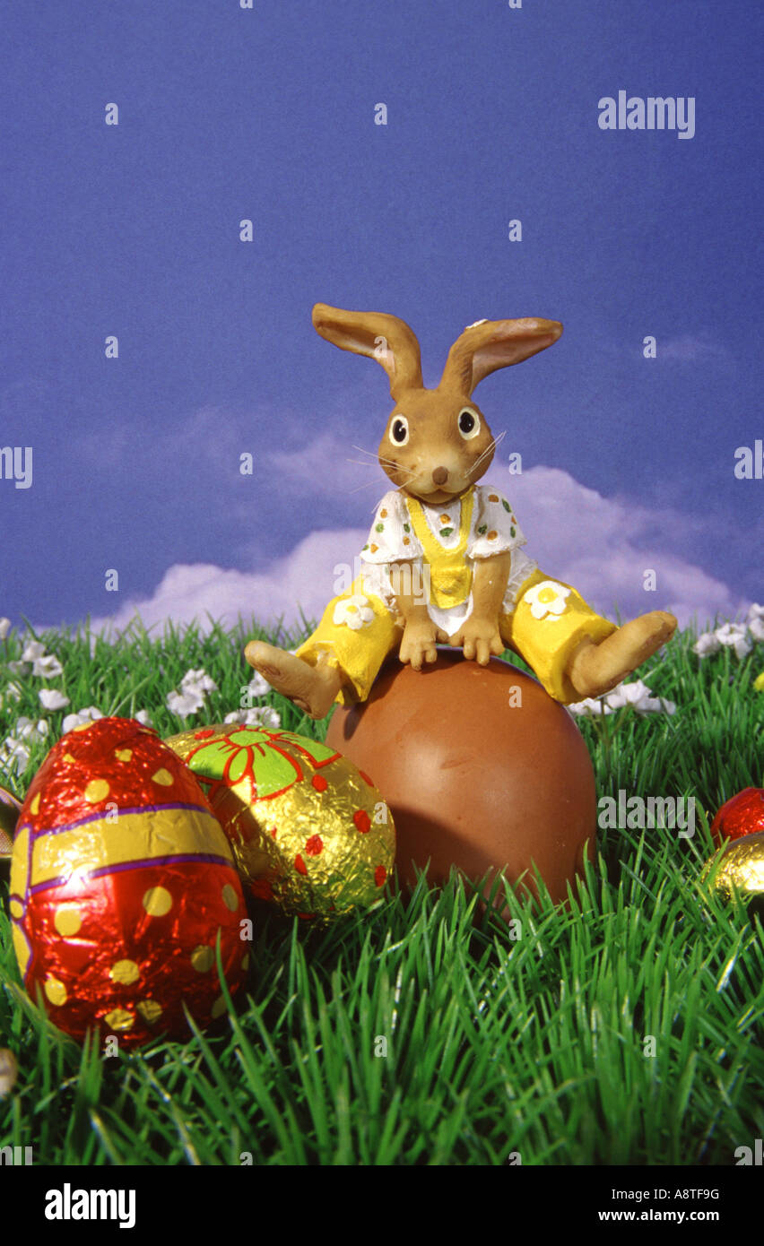 easter bunny jumping over easter egg Stock Photo Alamy