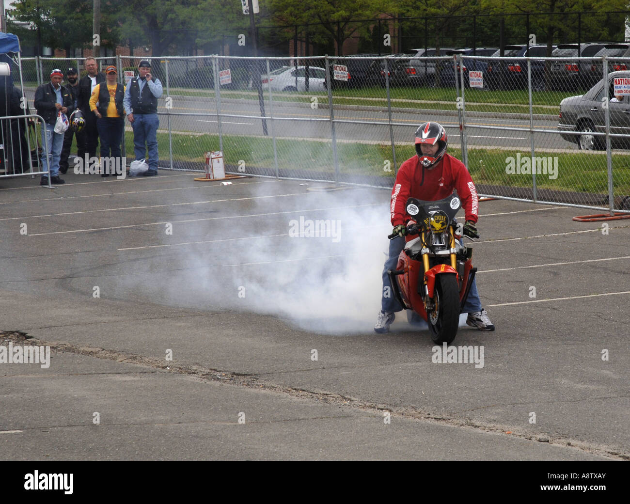 Motorcycle stunt group Riding To Raise Money at Super Sunday Rally. Stock Photo