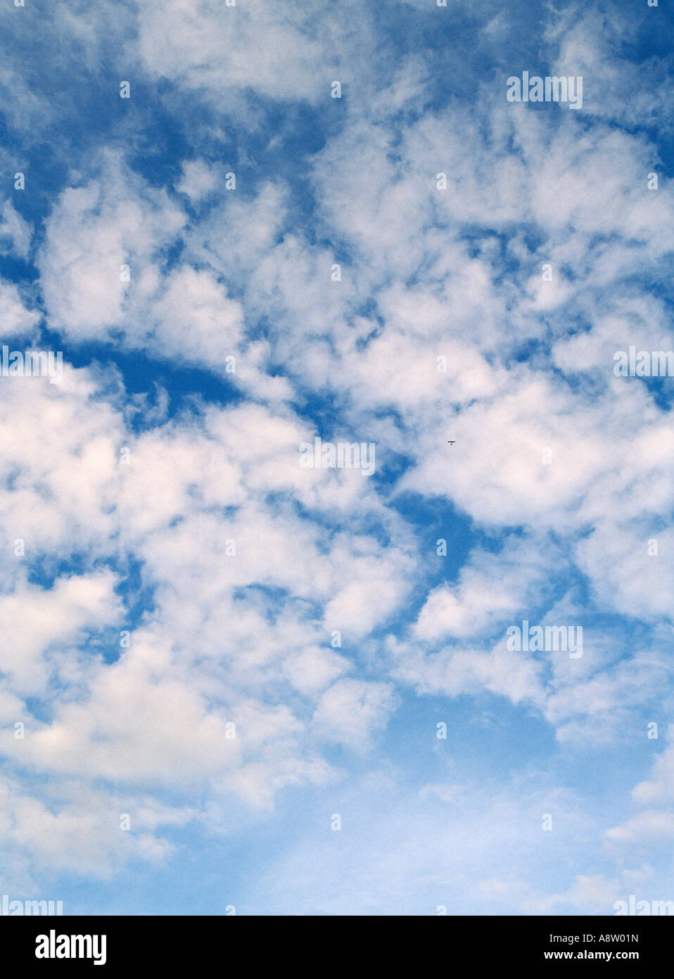 Scenic. Blue sky with white altocumulus clouds. Stock Photo
