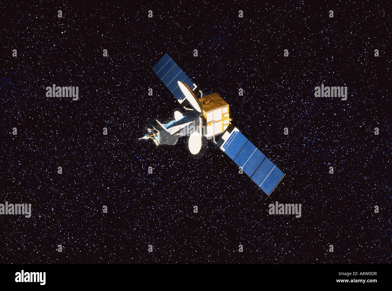 Communications satellite in Earth's orbit  with solar panels deployed. Stock Photo