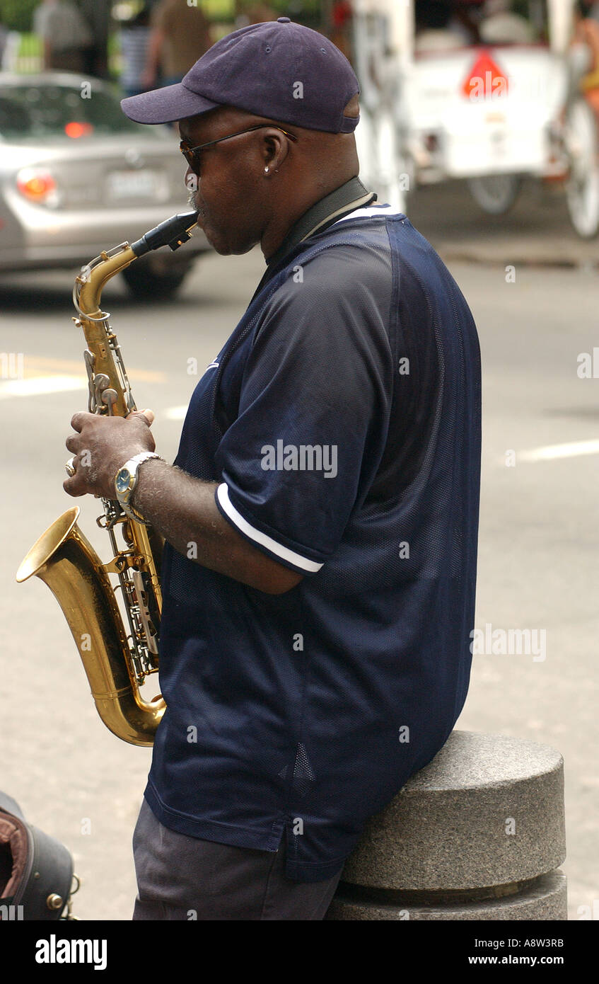 JAZZ PERFORMER PLAYING SAXOPHONE ON STREET FOR MONEY Stock Photo Alamy