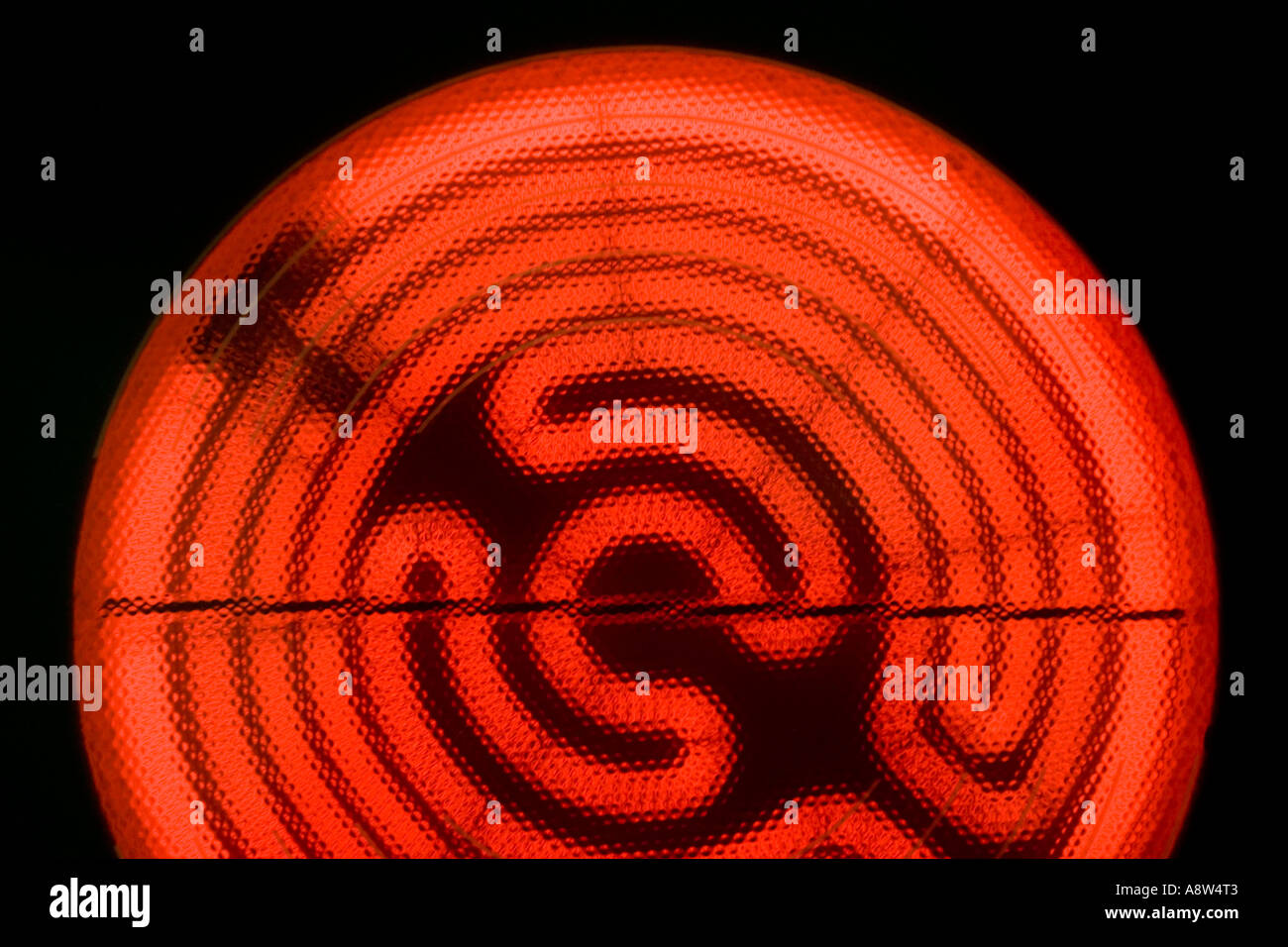 Germany, Glowing heating coil of a hot plate on a glass ceramic hobs Stock Photo Alamy