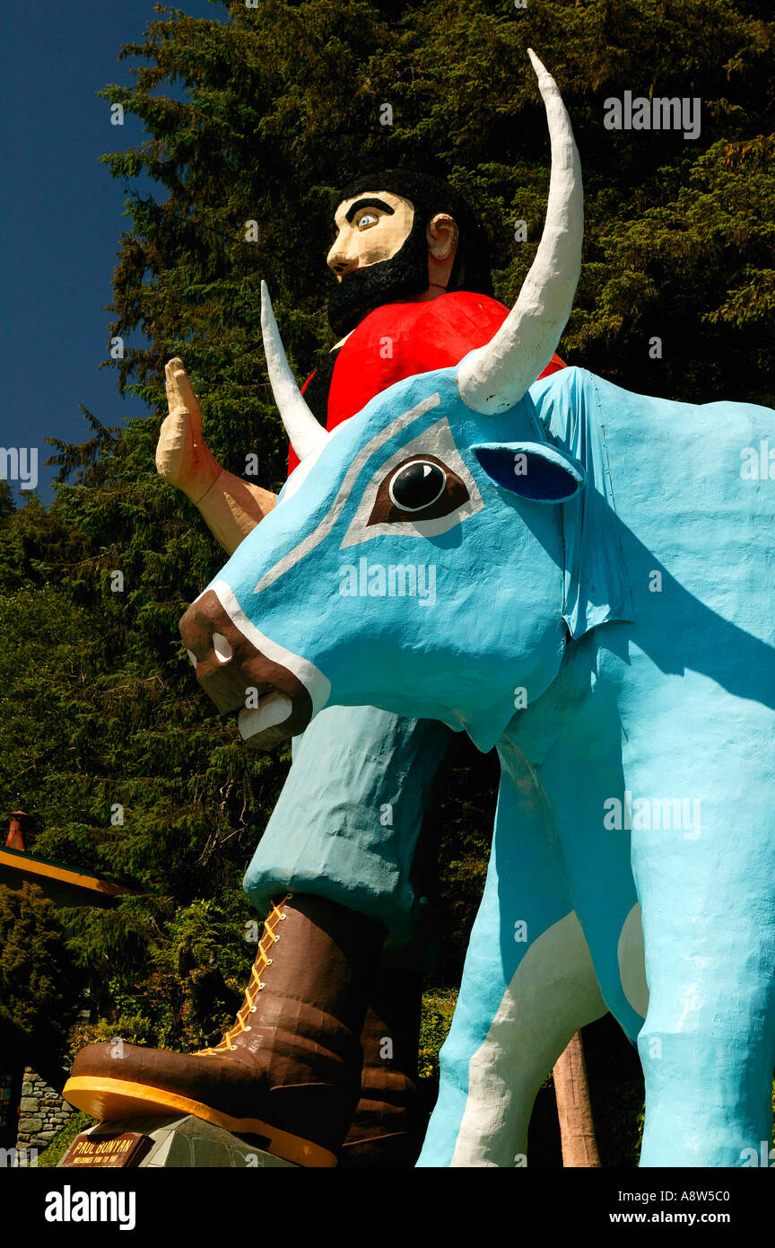 The Trees of Mystery statues of Paul Bunyan and his Blue Ox Babe stand out front near the Redwoods State and National Parks Cali Stock Photo