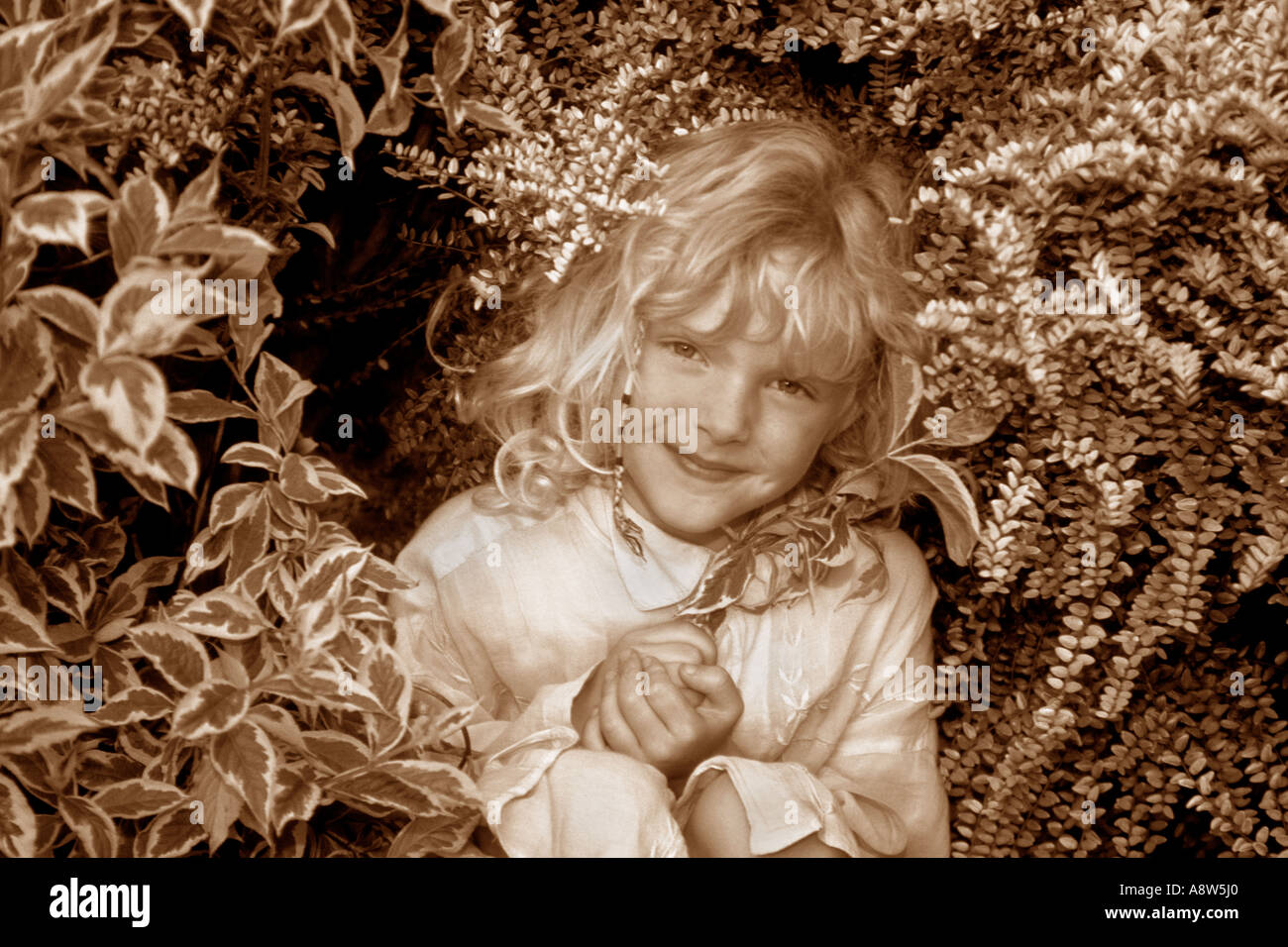 Girl In The Garden Stock Photo - Alamy