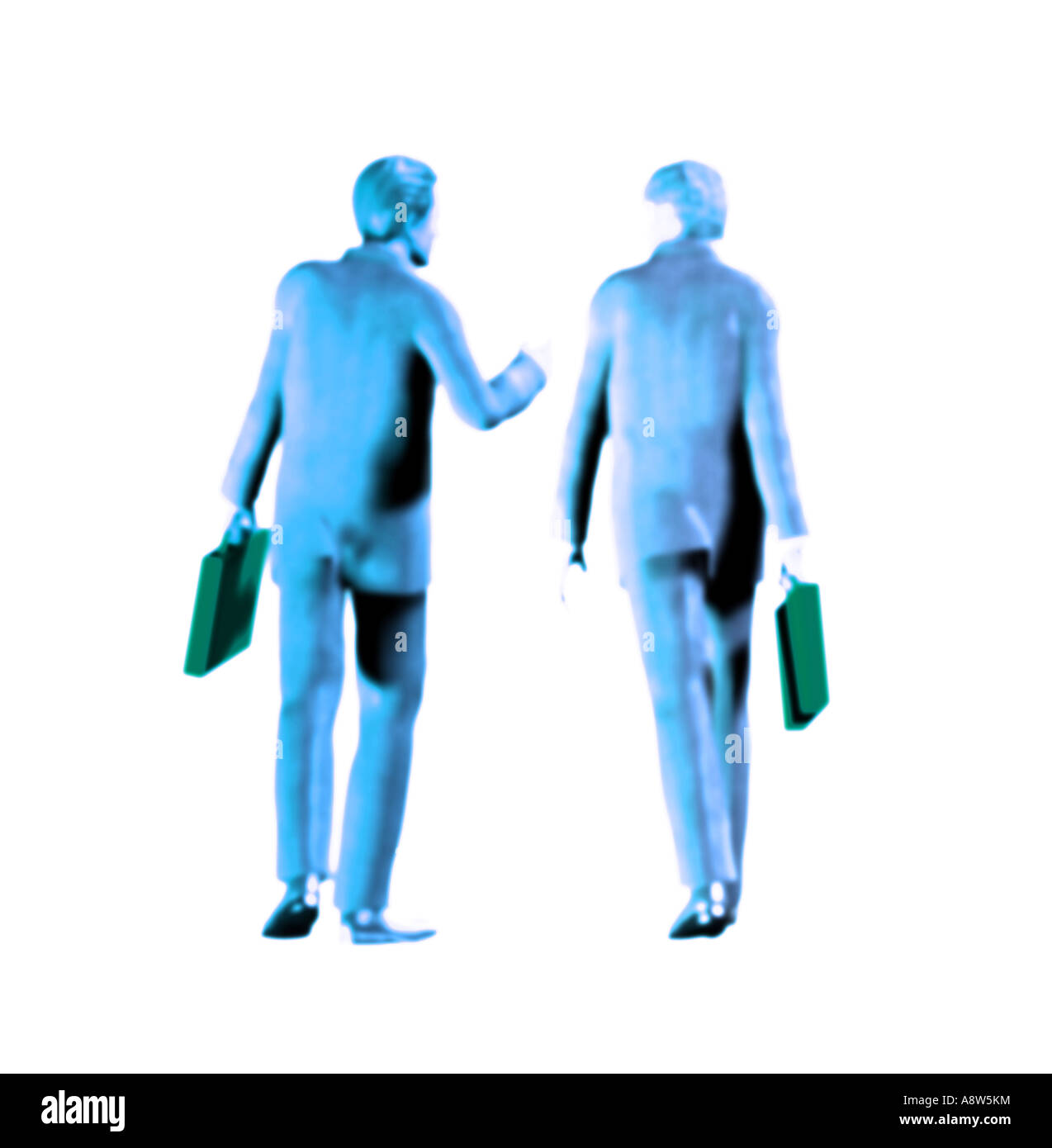 Two businessmen walking and talking Stock Photo - Alamy
