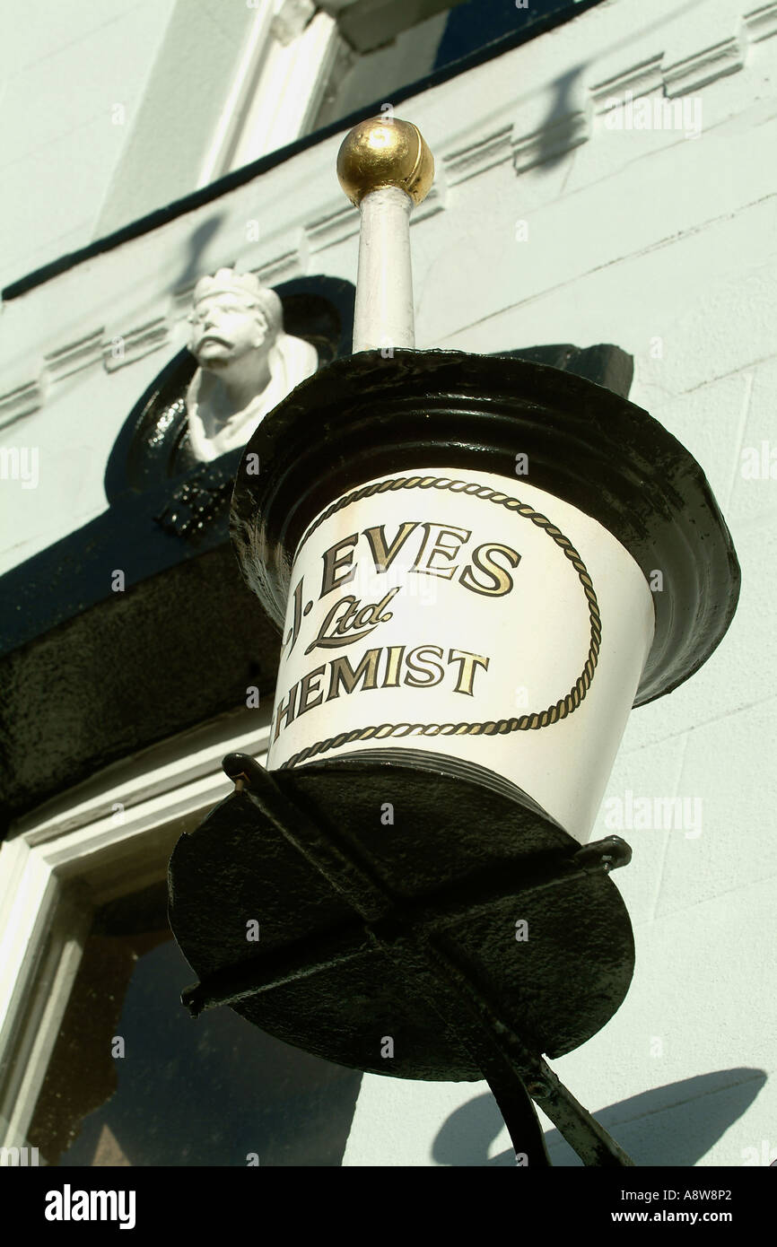 Pestle and Mortar Chemists exterior shop sign, AJ Eves Ltd, Chemist, High Street, Wigton