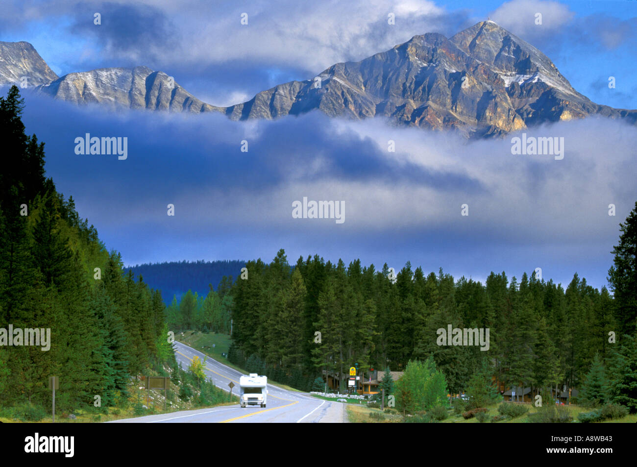 A RV on the Icefields Highway and Pyramid Mountain just outside of