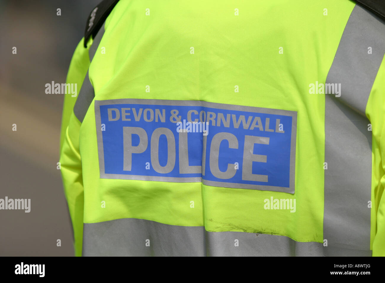 Devon and Cornwall Police officer wearing reflective yellow jacket Cornwall UK Stock Photo