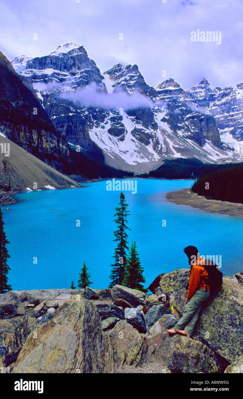 Woman admiring Moraine Lake, Banff National Park, Canada Stock Photo