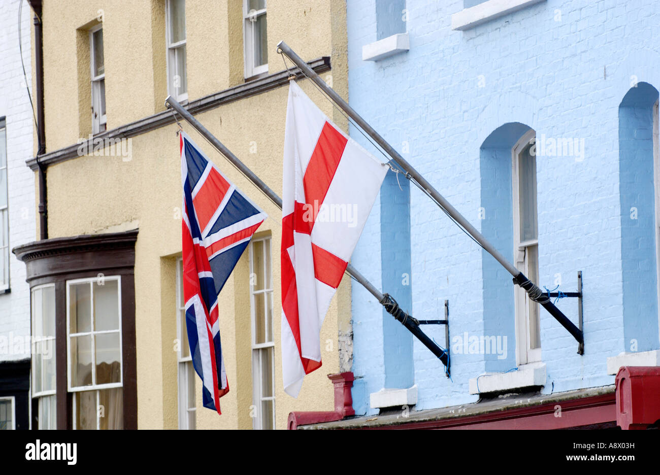 https://c8.alamy.com/comp/A8X03H/flags-flying-outside-bennetts-on-the-waterfront-harbourside-fish-and-A8X03H.jpg