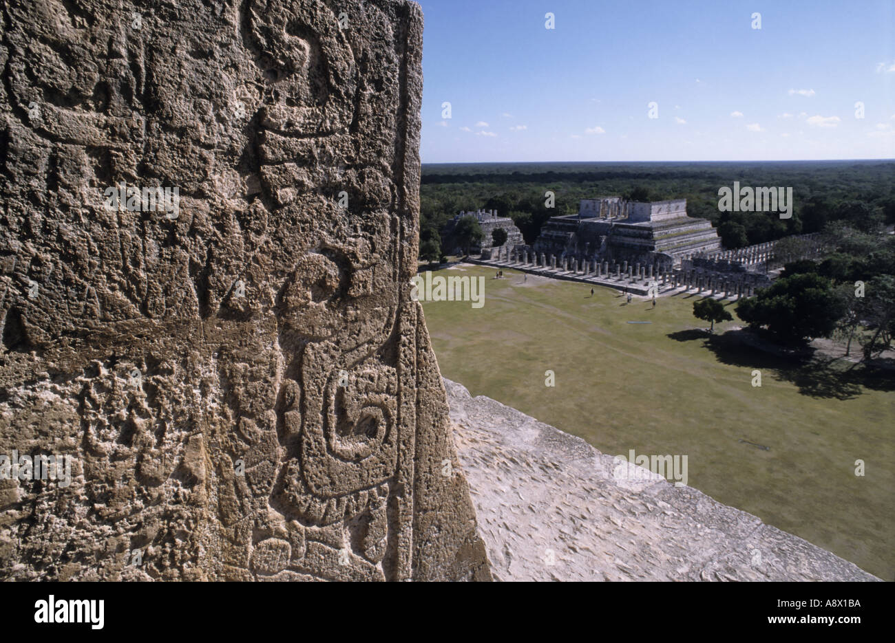 Chichen Itza site from top of the Pyramid Of Kukulcan looking towards the Temple Of A Thousand Warriors with symbols Stock Photo