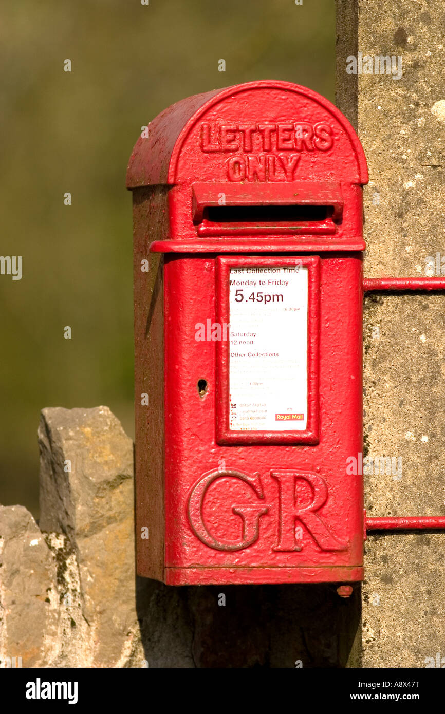 A small letters only post box mounted on a post Its from the reign of