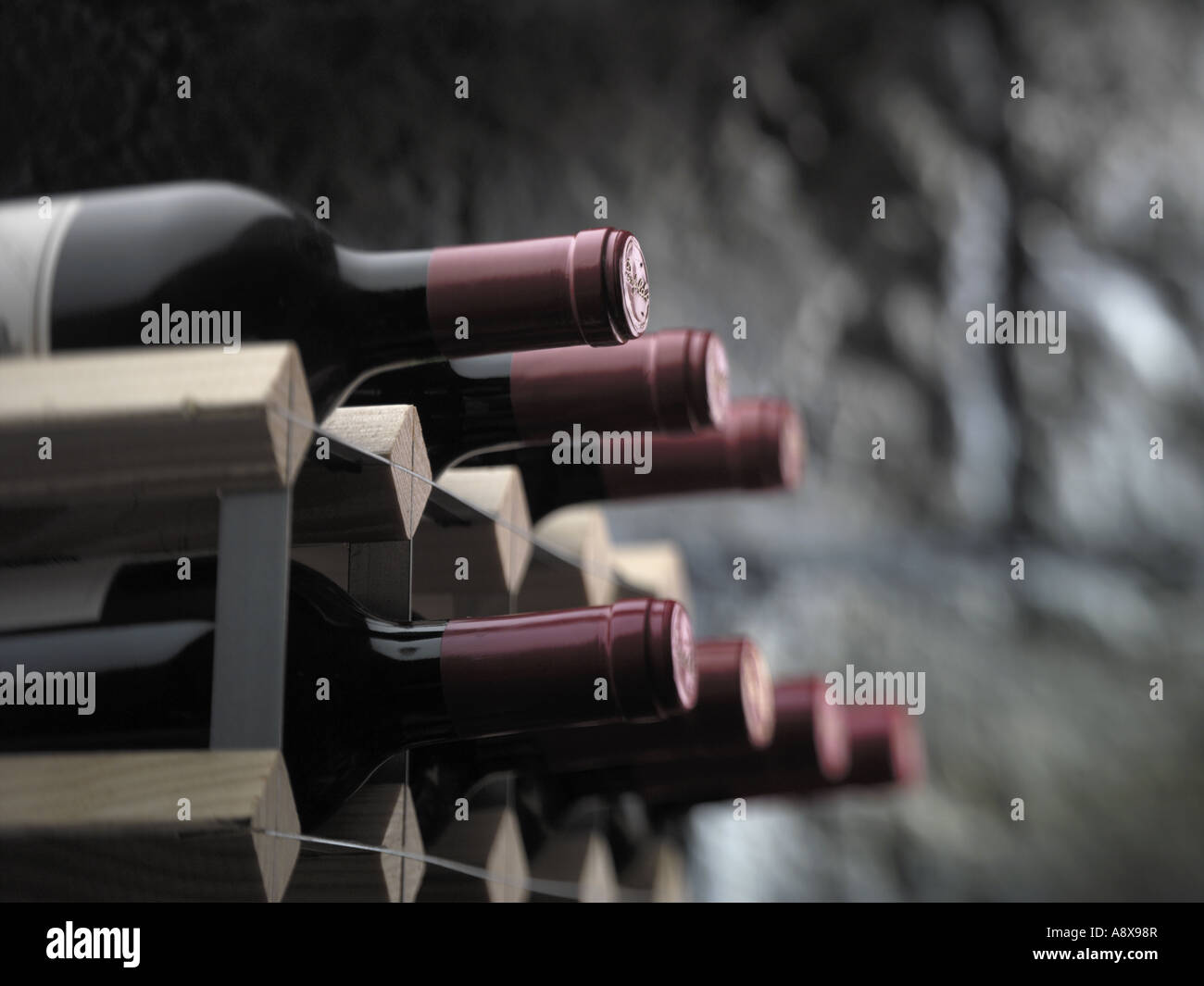 Bottles of Red Wine on a storage rack Stock Photo Alamy