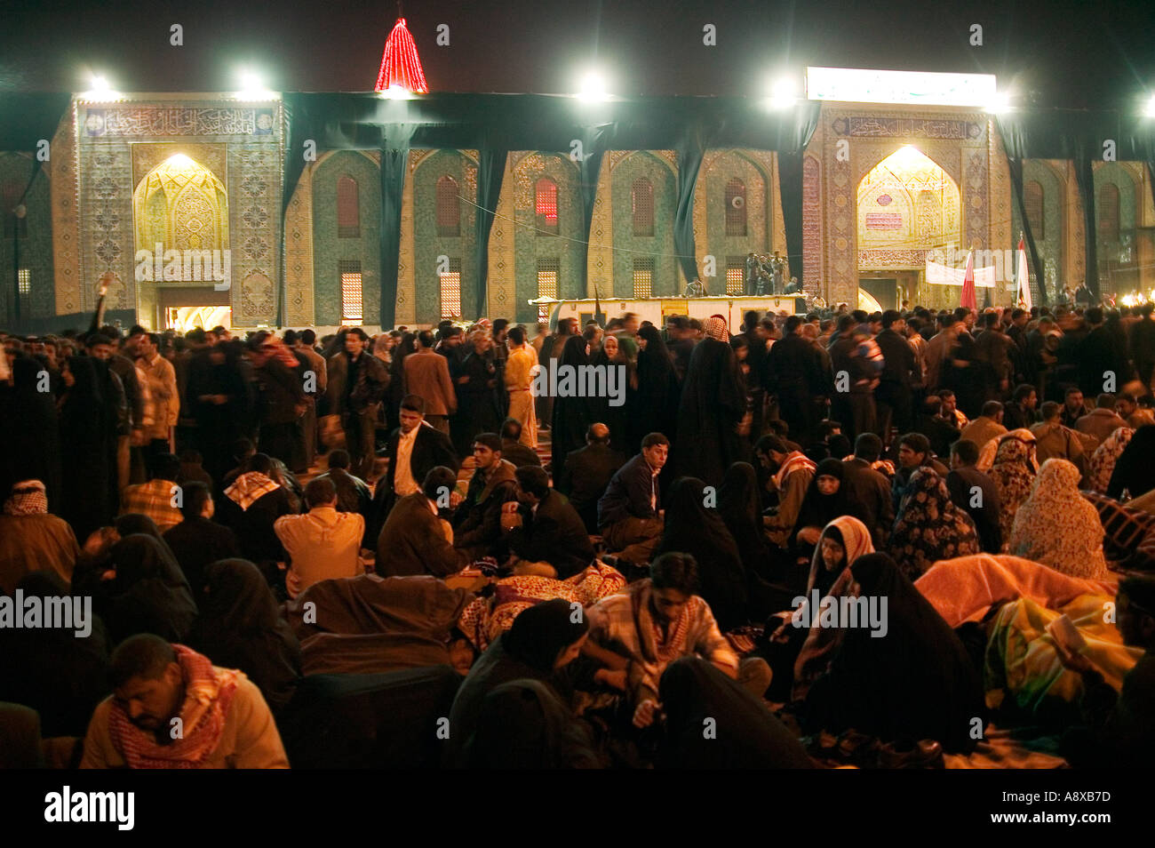 Pilgrims in front of Hazrat Abbas Shrine on Ashura s Eve Karbala 01 03 04 Stock Photo