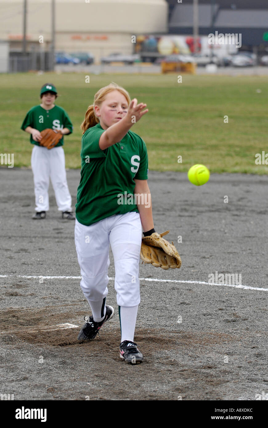 Young girls play softball Stock Photo