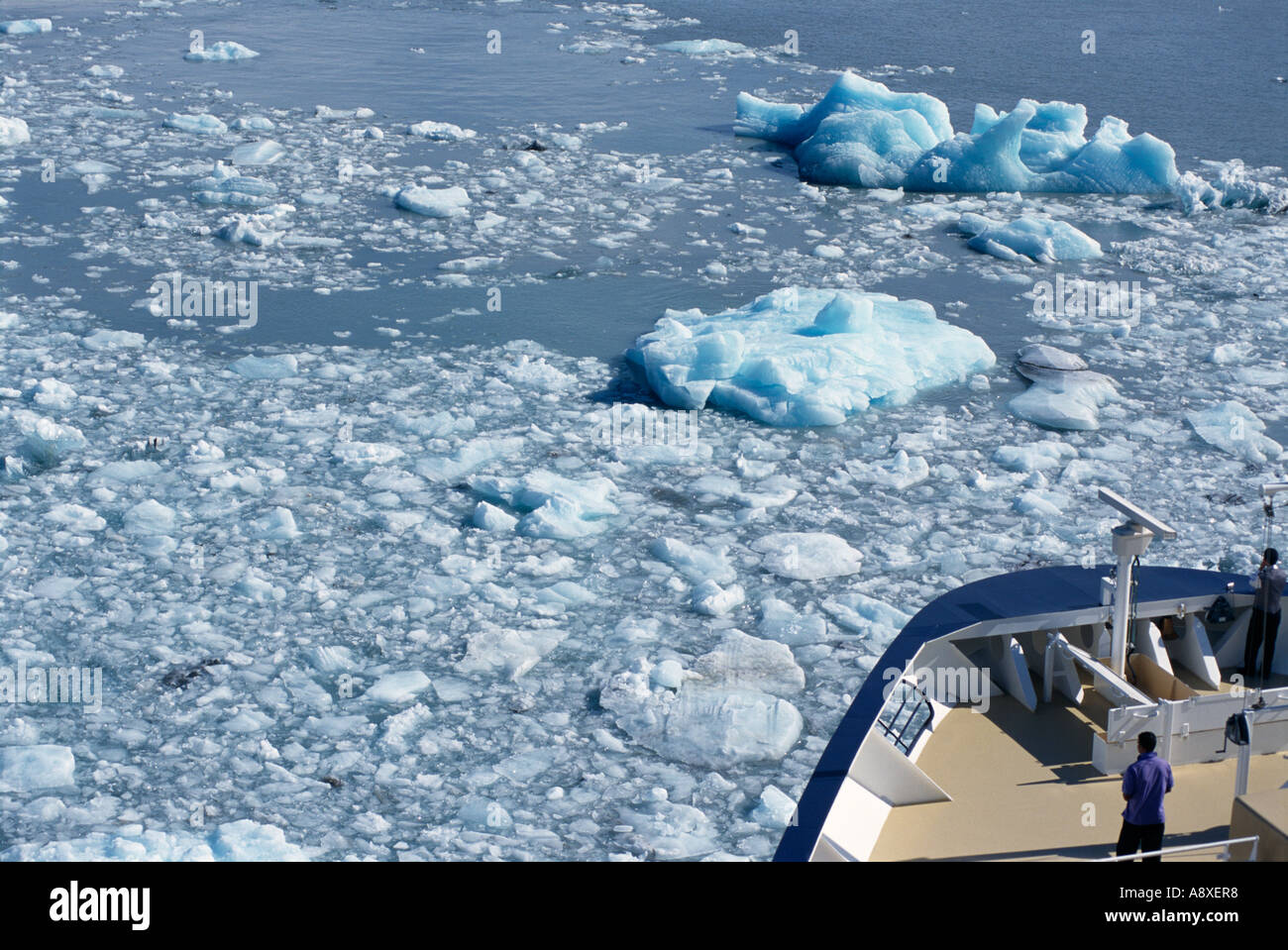 A cruise ship navigates its way through an ice floe on its way to visit ...