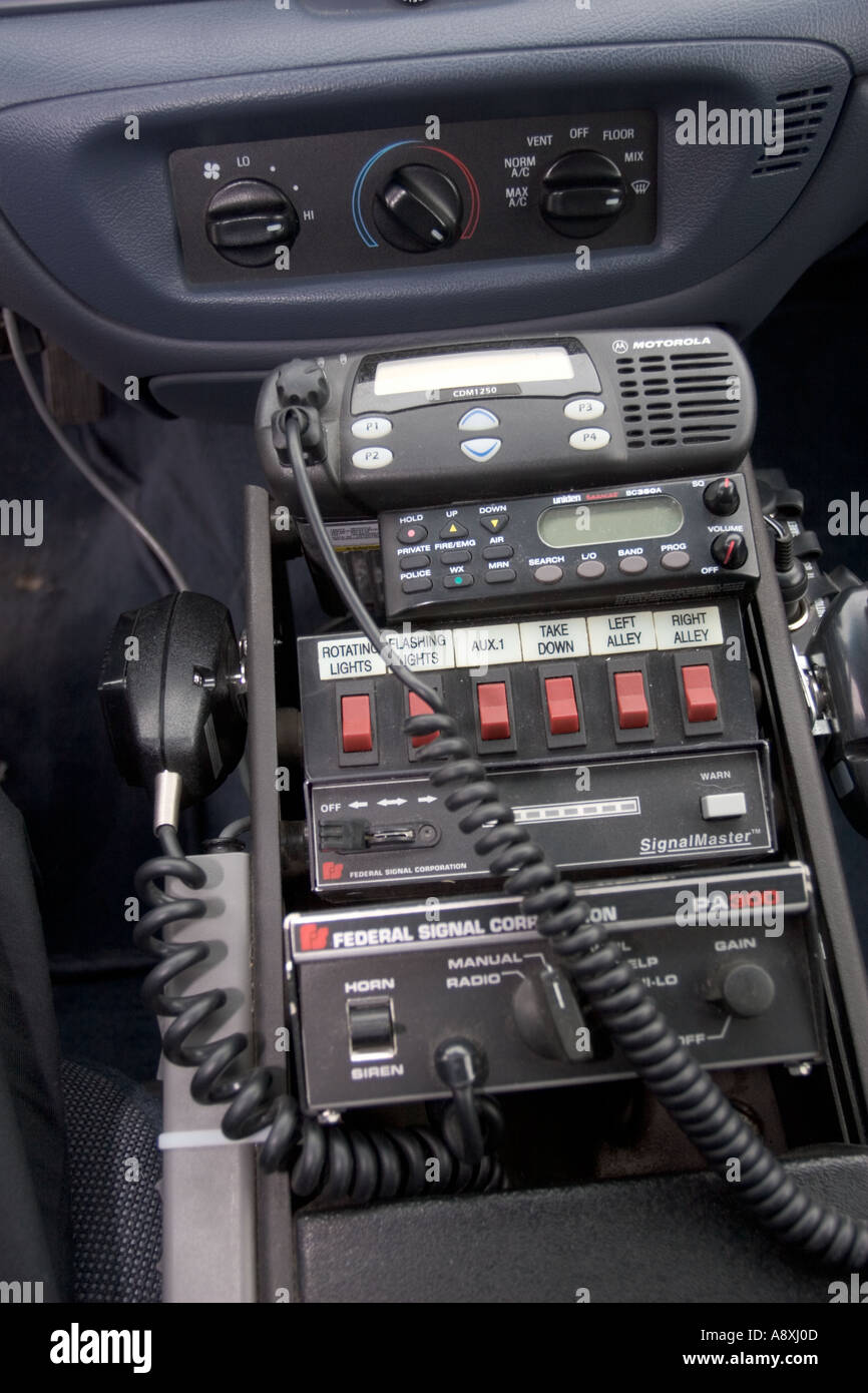 Communications stack in patrol vehicle Radio receivers and microphone  scanners control hub for lights and sirens Stock Photo - Alamy