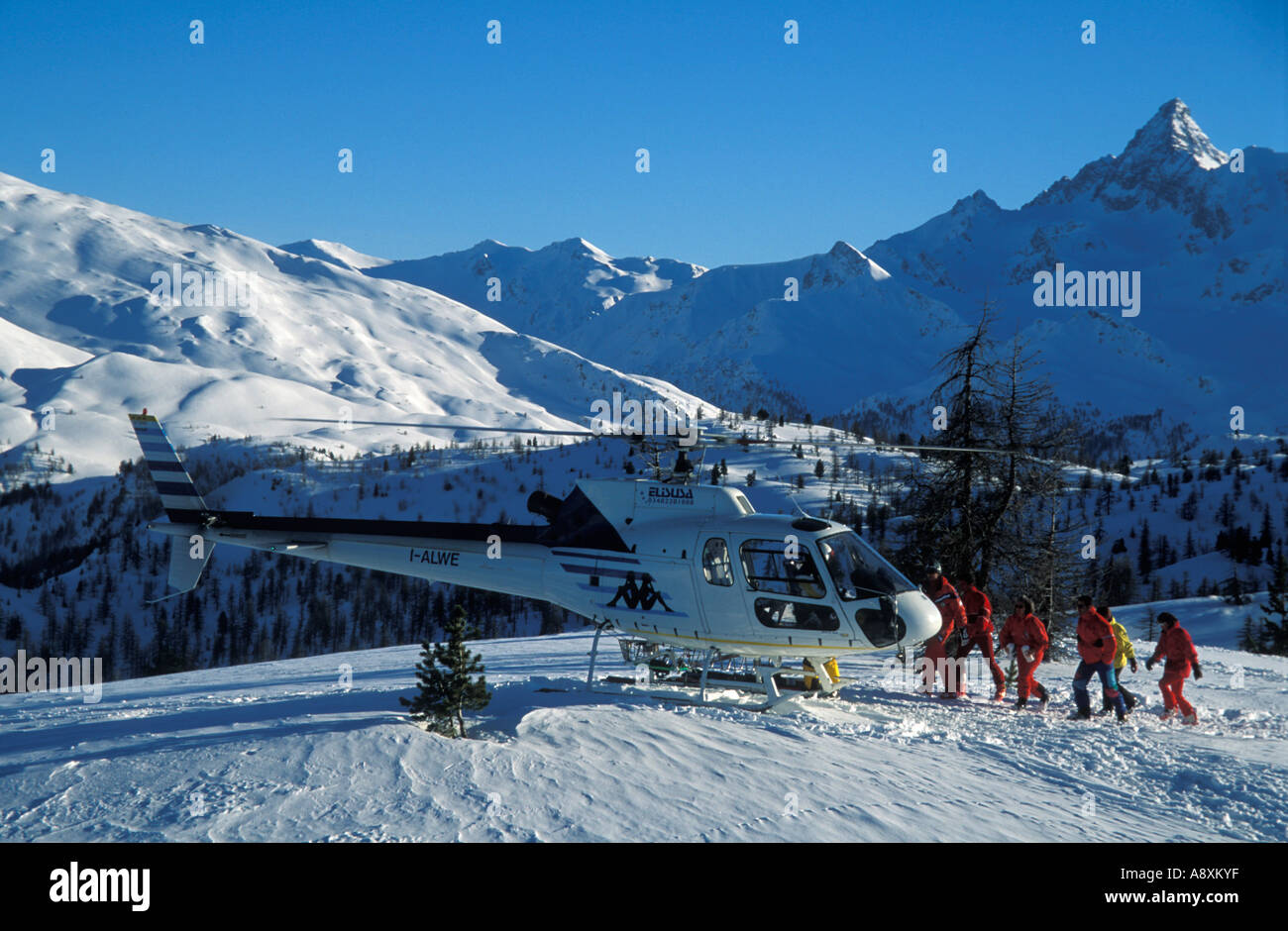 Helicopter skiing Claviere Italy Stock Photo