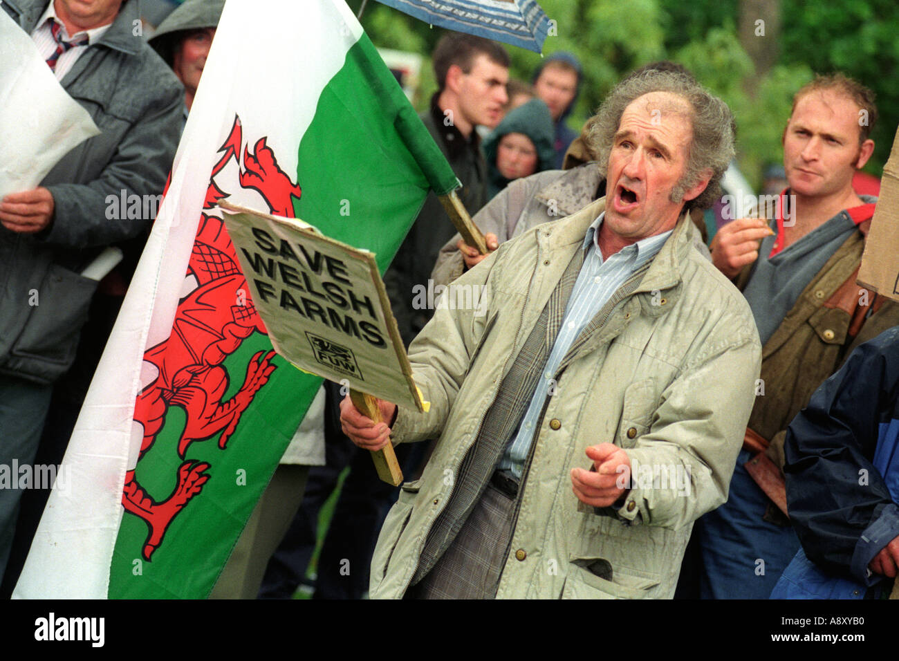 Farmers sing the Welsh National Anthem at a rally to save Welsh farms in Cardiff South Wales UK Stock Photo