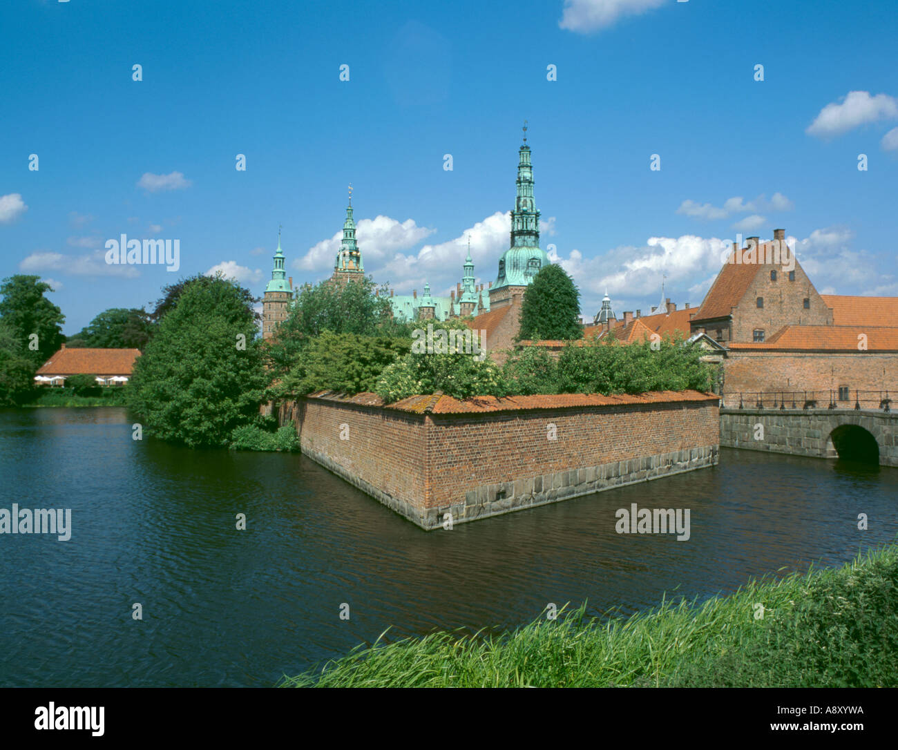 Frederiksborg Slot seen over the moat, near Hillerød, Fredriksborg, Sjælland (Zealand), Denmark. Stock Photo