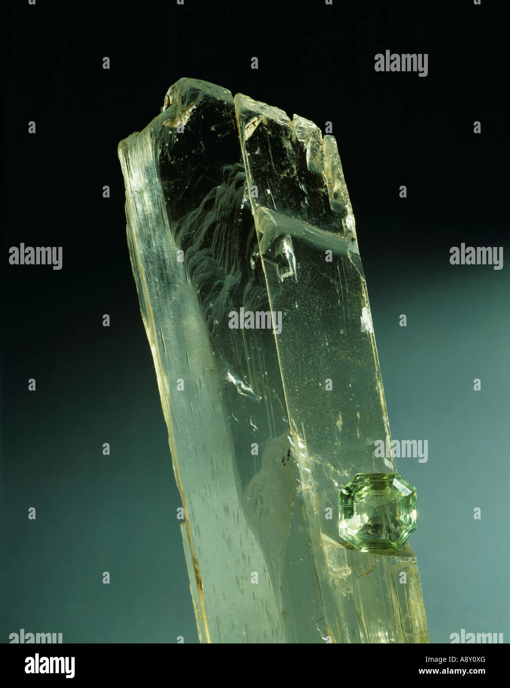 Spodumene crystal and cut stone Stock Photo