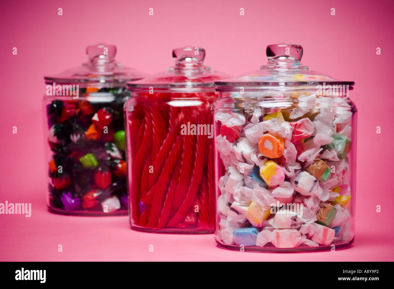 Saltwater taffy licorice and fruit flavored hard candy in glass