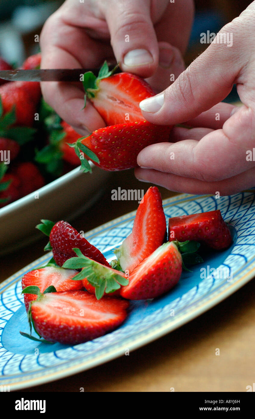 chef-slicing-strawberries-stock-photo-alamy