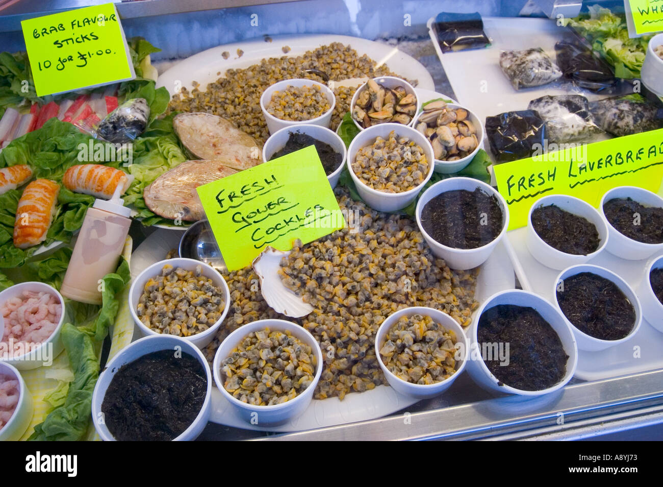 Cockles and Laverbread on Sale Swansea Market Swansea South Wales Stock
