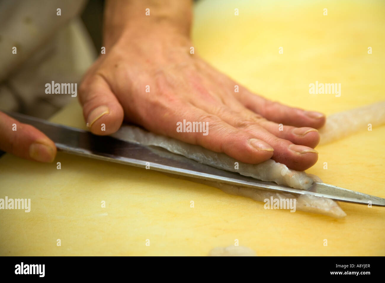 Filleting a Fugu blowfish for sashimi in a Japanese restaurant Stock Photo