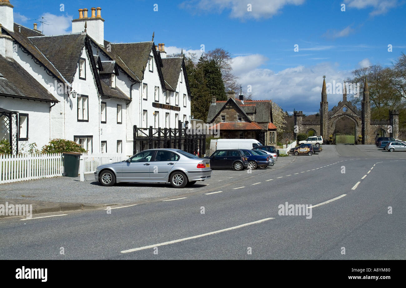 dh  KENMORE PERTHSHIRE White hotel and Taymouth castle estate archway scottish village road scotland street A827 Stock Photo